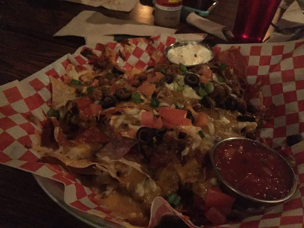 Loaded nachos with salsa on the side at the Duchess Tavern